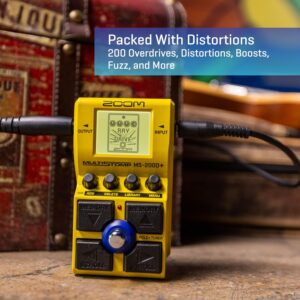 Guitarist experimenting with different distortion and overdrive effects while creating new music
